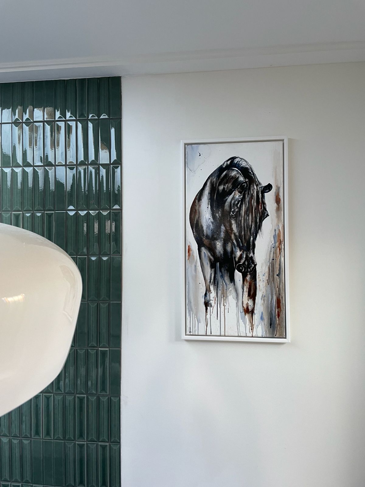 Aurora, dark horse watercolour in a white frame at the collector's home