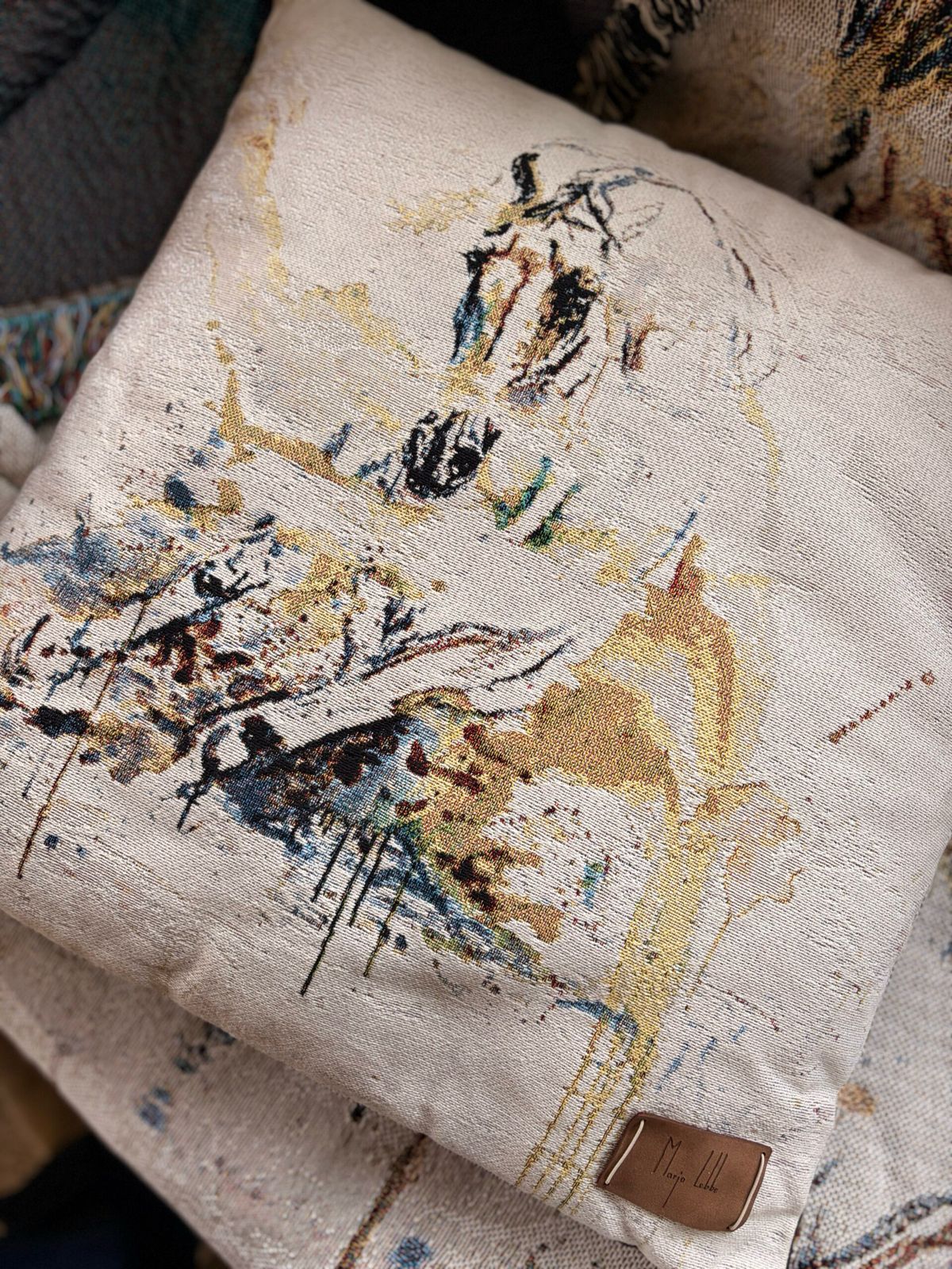 Woven equine art cushion with Marjo Lebbe label