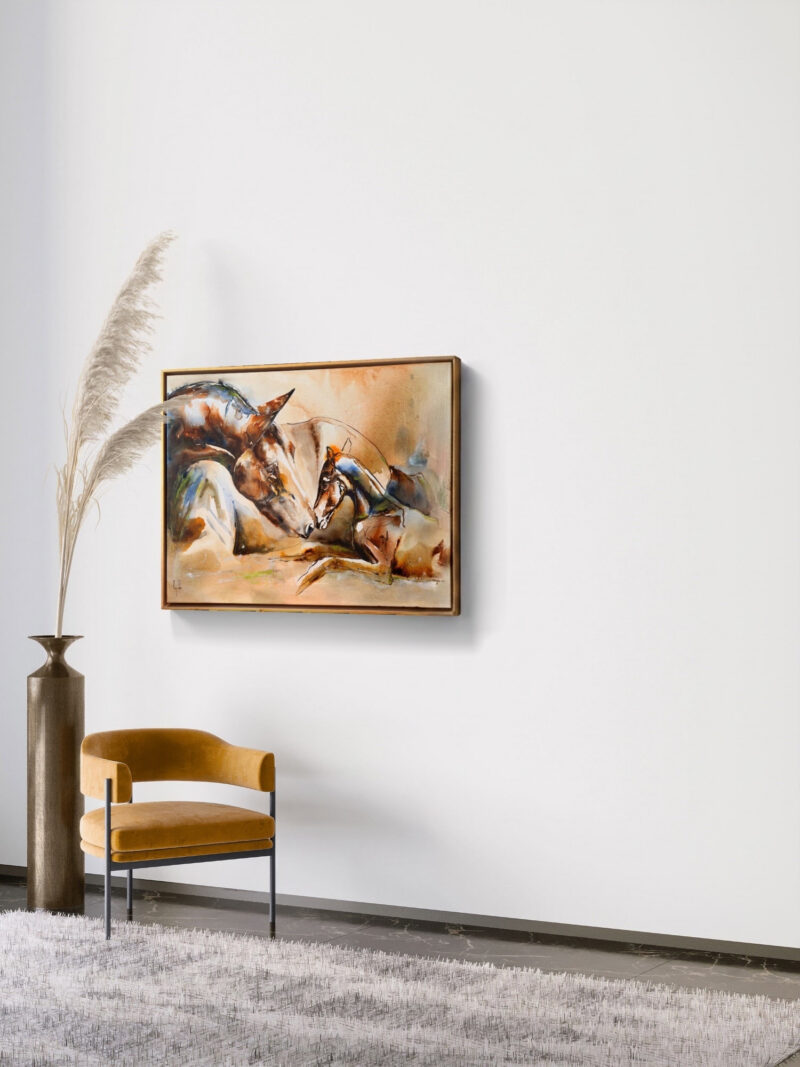 Healing Birth framed on a white wall beside a mustard armchair and dried grasses