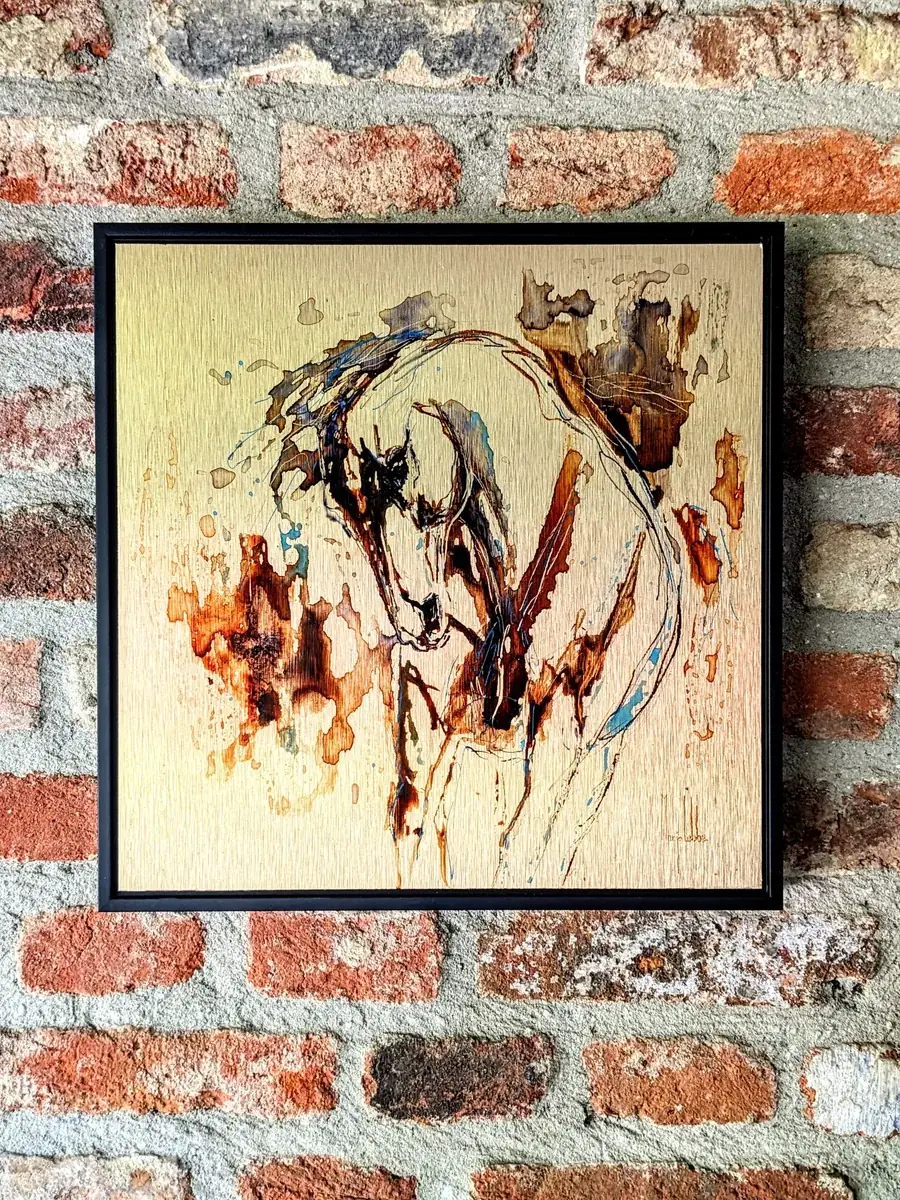Anima Ferox framed against a brick wall, light catching the metal
