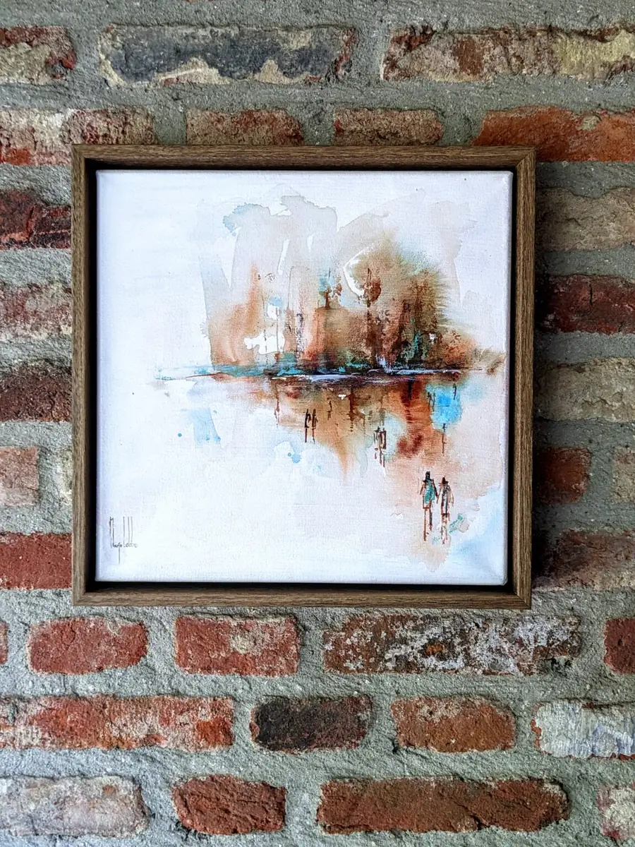 The painting hanging on a brick wall, its size readable against the courses of brick