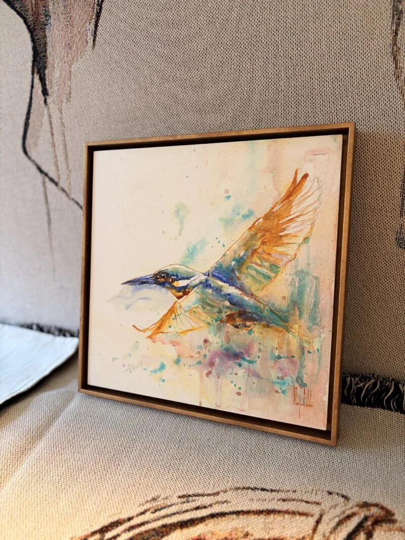 Bird Soul, the kingfisher seen at an angle, showing the depth of its wooden floating frame with a gold edge