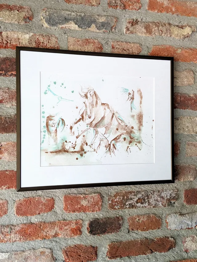 Equus et Avis hanging framed on a brick wall