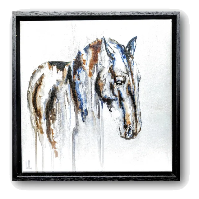 Serene in its black wooden frame, photographed straight on